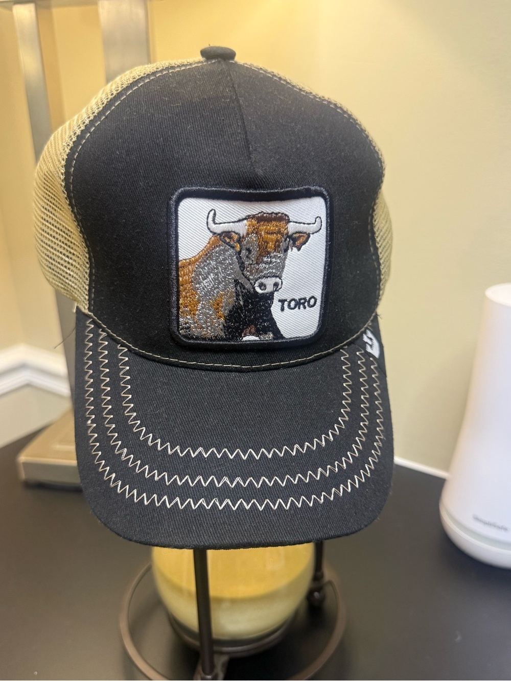 Source Unknown Black and Tan Toro Patch Trucker Hat
